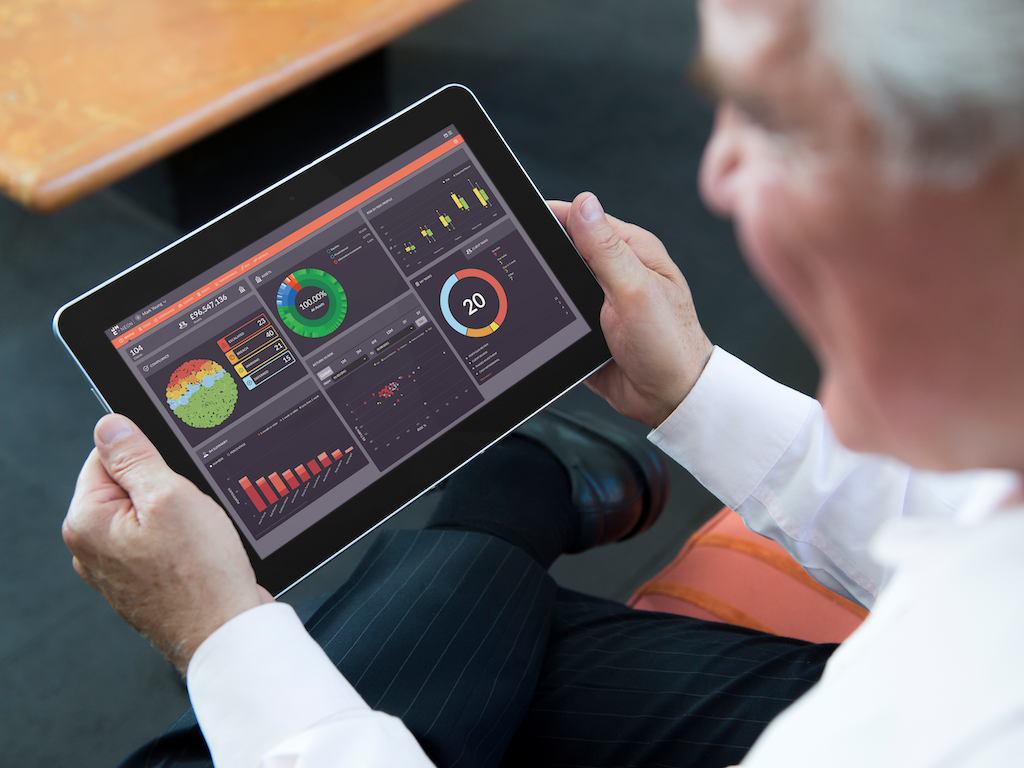 JHC-mockup-template-of-elderly-man-using-an-android-tablet